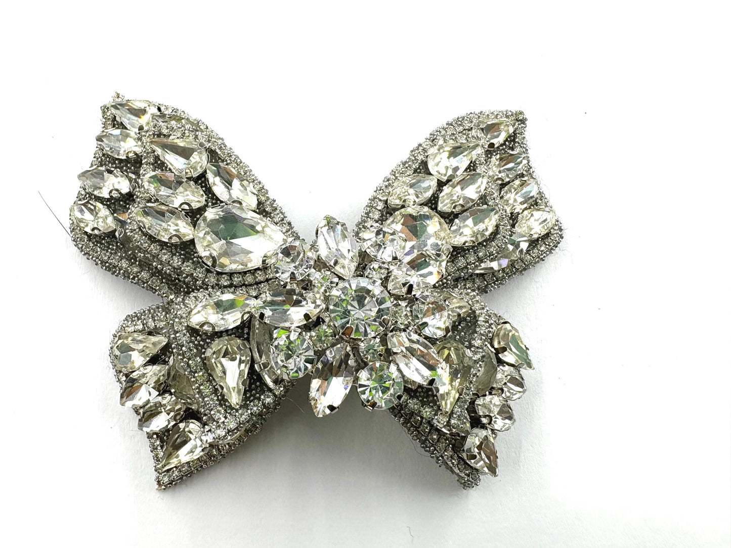 Handmade silver tone rhinestone butterfly patch on clothing