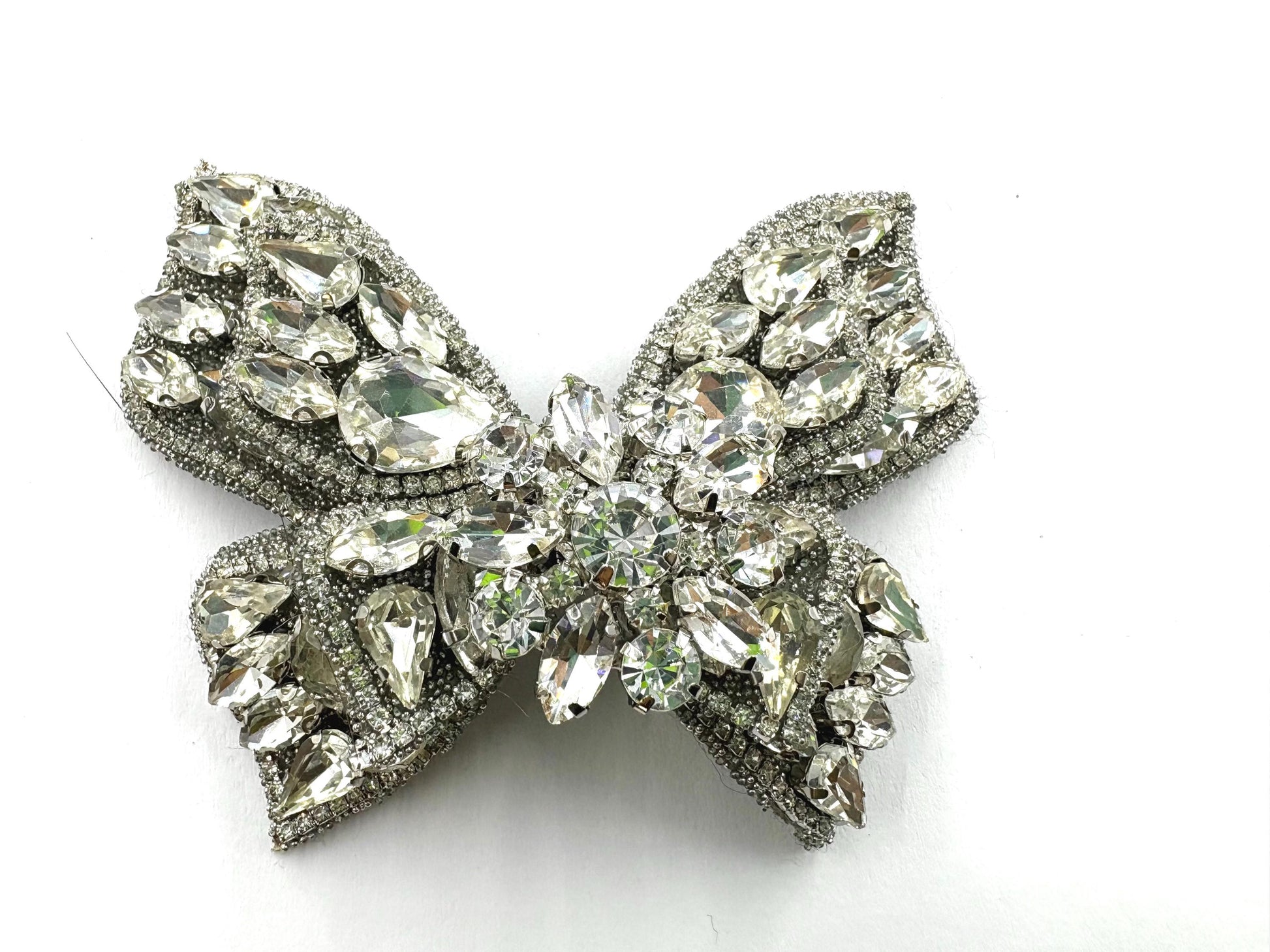 Handmade silver tone rhinestone butterfly patch on clothing